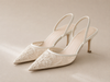 Fleur bestickte Slingback-Pumps